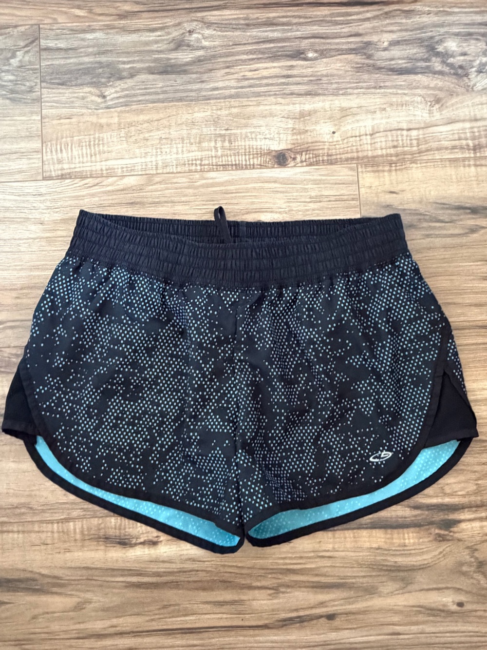 Champion Black Shorts with Teal Dot Accent